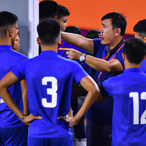 Huấn luyện viên Thái Lan chỉ đạo cho các cầu thủ của mình trong trận đấu tại Asian Cup